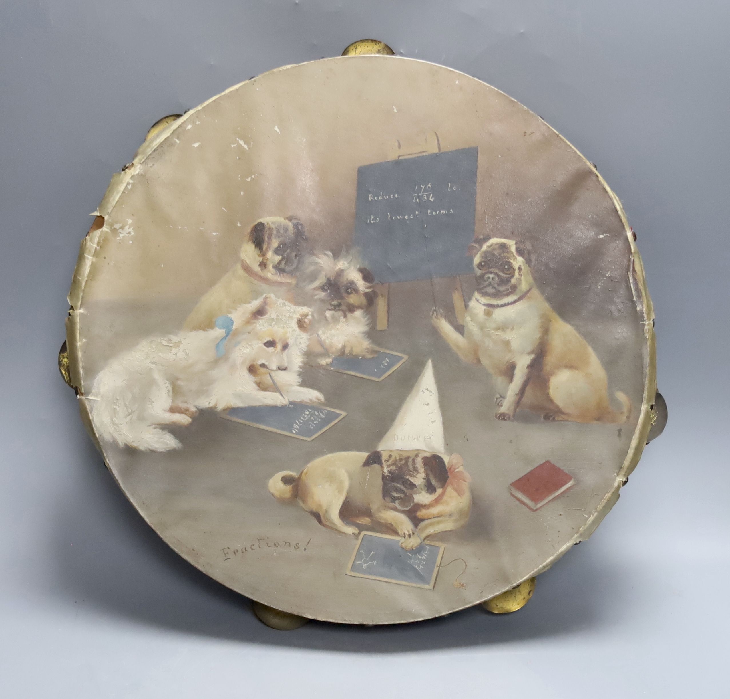 A painted tambourine, inscribed 'Fractions!’, the vellum decorated in oils with a group of small dogs learning mathematics, Dia 38cm